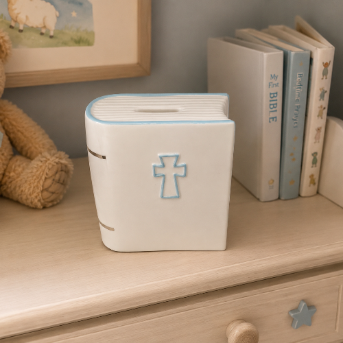 White porcelain baby bank with a blue cross