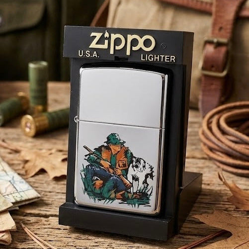 Zippo lighter with a hunting design in packaging on a rustic background