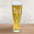 Groomsman beer glass with 'Andrew Groom Crew' engraving on a wooden surface and light gray background